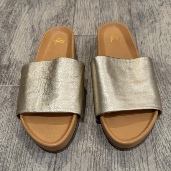 Beek gold Pelican leather platform sandals