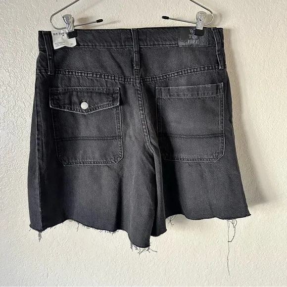 New free people We The Free Boomerang Long Shorts black denim size 31
