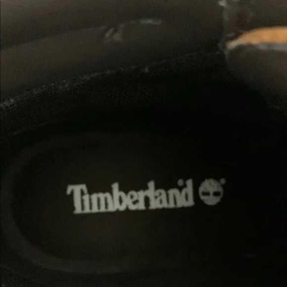NWOT Timberland Lace Up Boots Tan and Black Rugged Design.