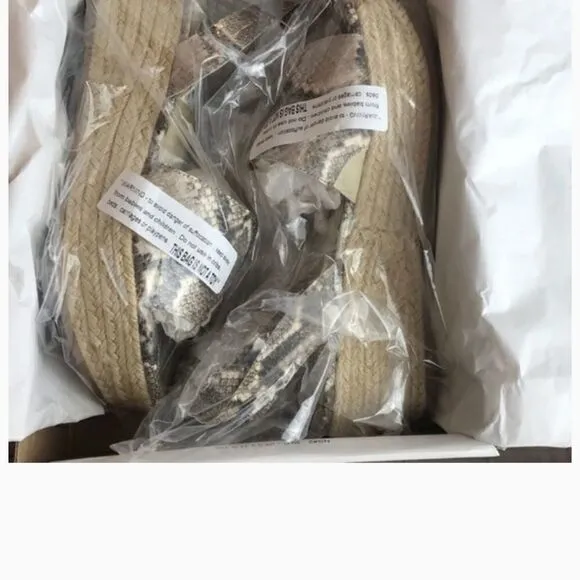 STEVE MADDEN CROC MOTIF PLATFORM SANDALS.…