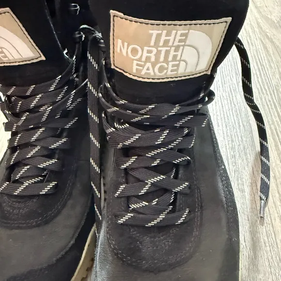 The North Face Black Boots with Padded Collar and Durable Design