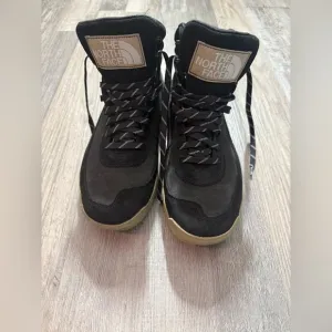 The North Face Black Boots with Padded Collar and Durable Design