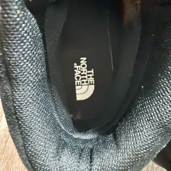 The North Face Black Boots with Padded Collar and Durable Design