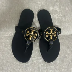 Tory Burch Metal Miller Soft | Black and Gold Sandals with Signature medallion